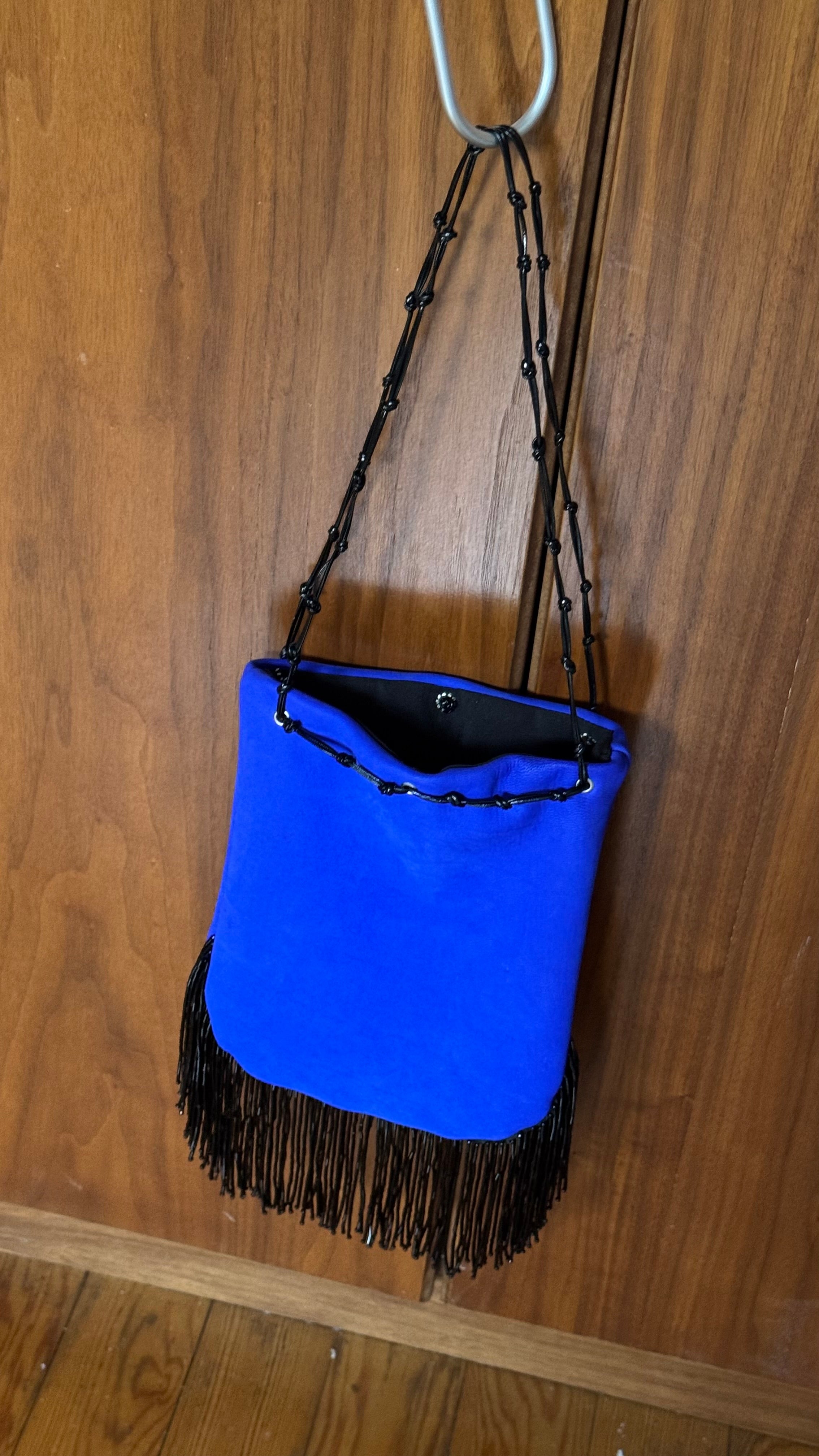 Suede leather fringed bucket bag
