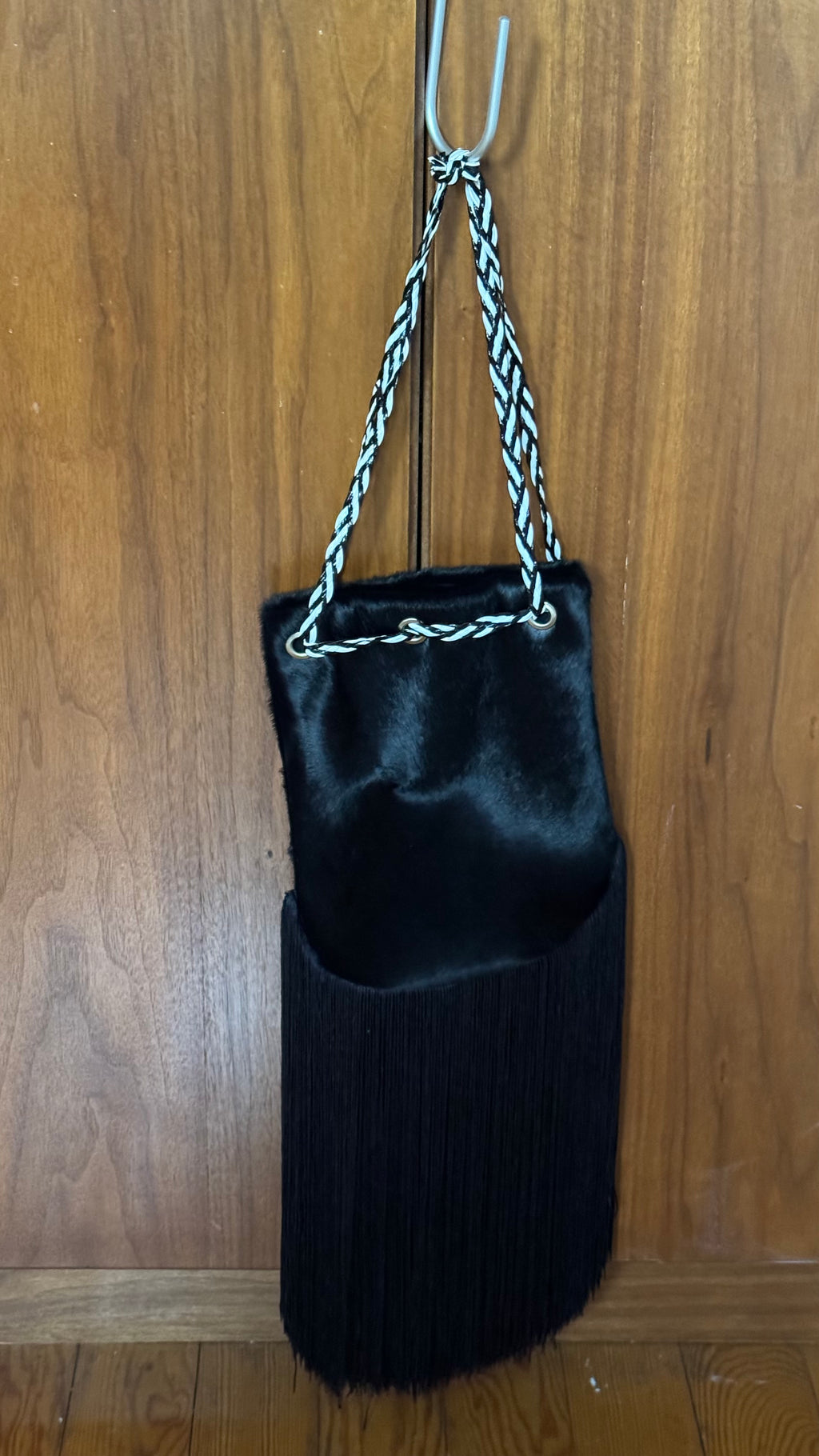 Pony hair fringed bucket bag