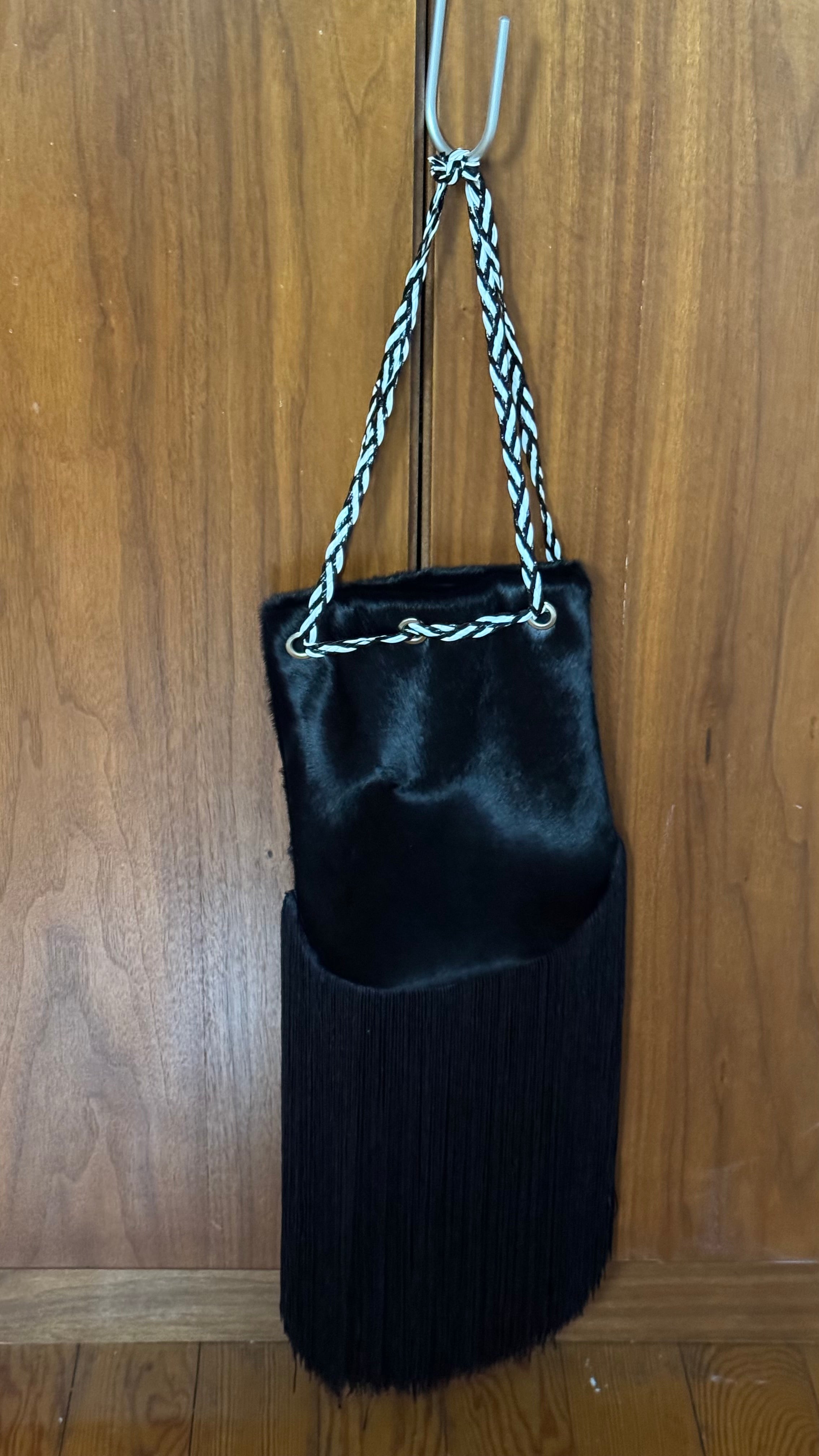 Pony hair fringed bucket bag