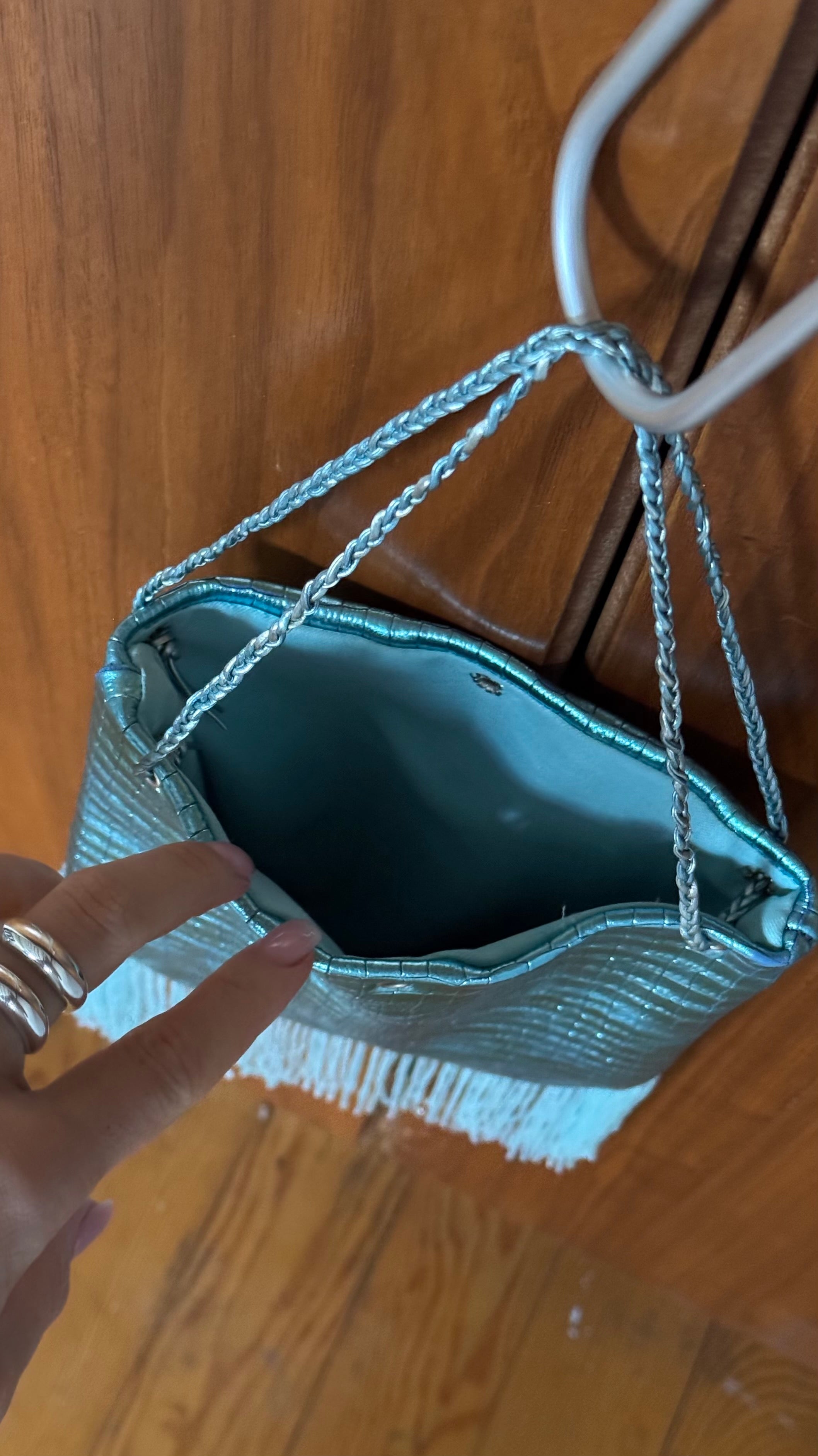 Crocodile embossed fringed bucket bag