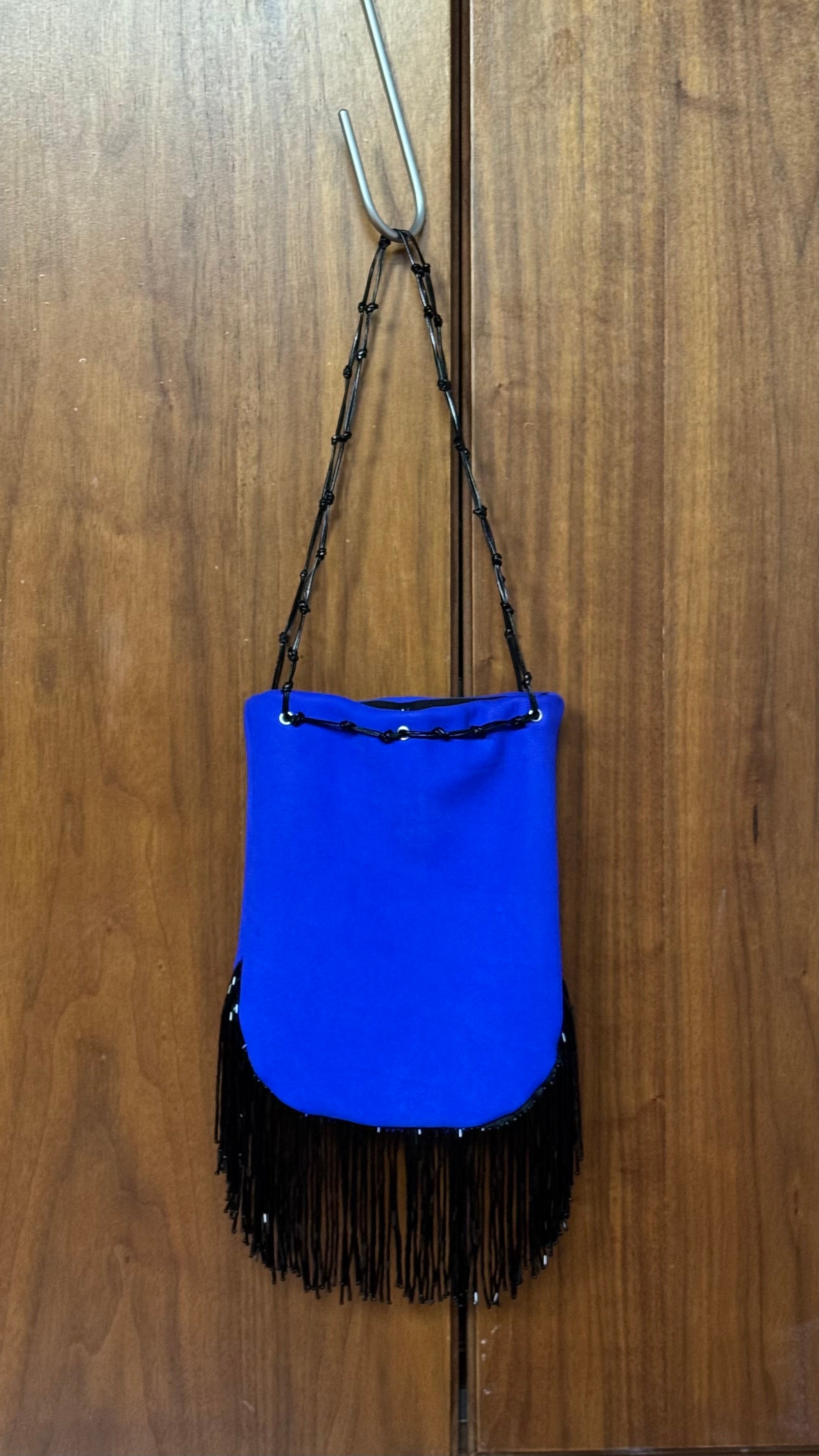 Suede leather fringed bucket bag