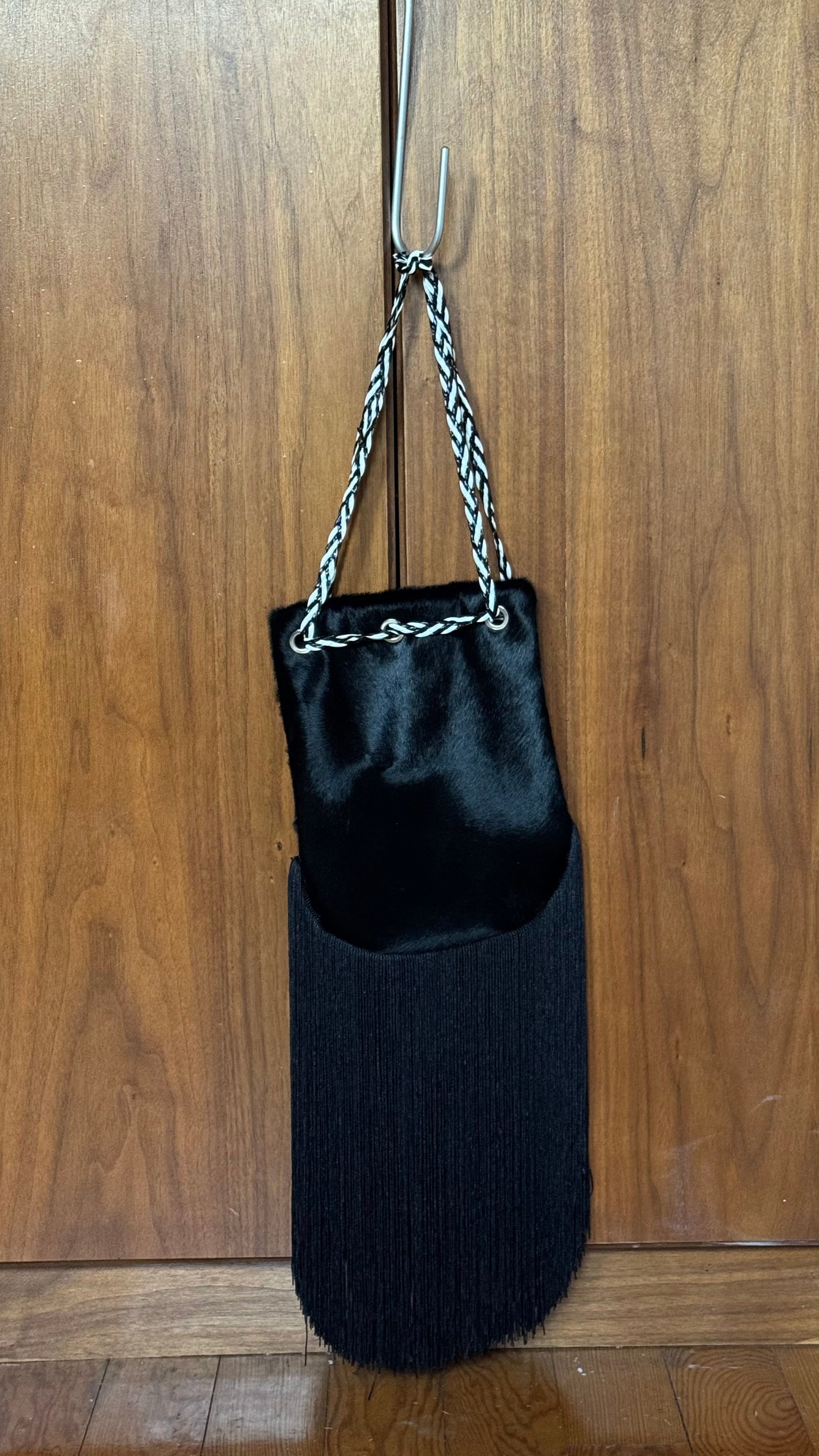 Pony hair fringed bucket bag